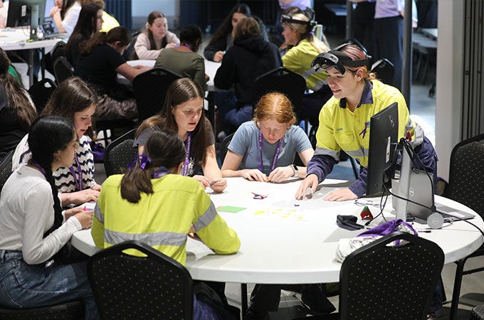 A group of females at the UOW EmpowerHER STEM Summit at Port Kembla